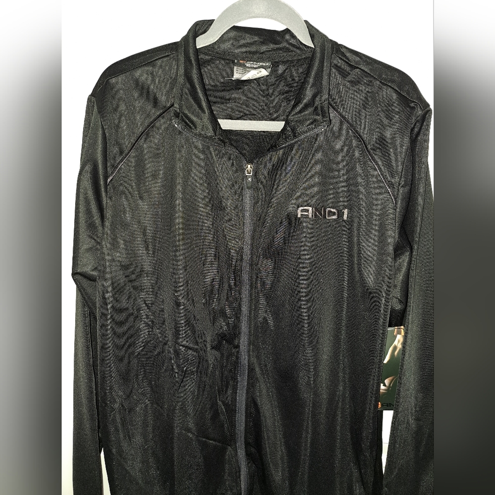 AND1 black sweatshirt with front zipper in size M.